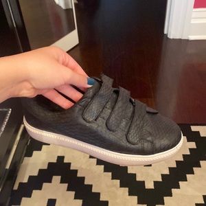 Black snake sneakers.